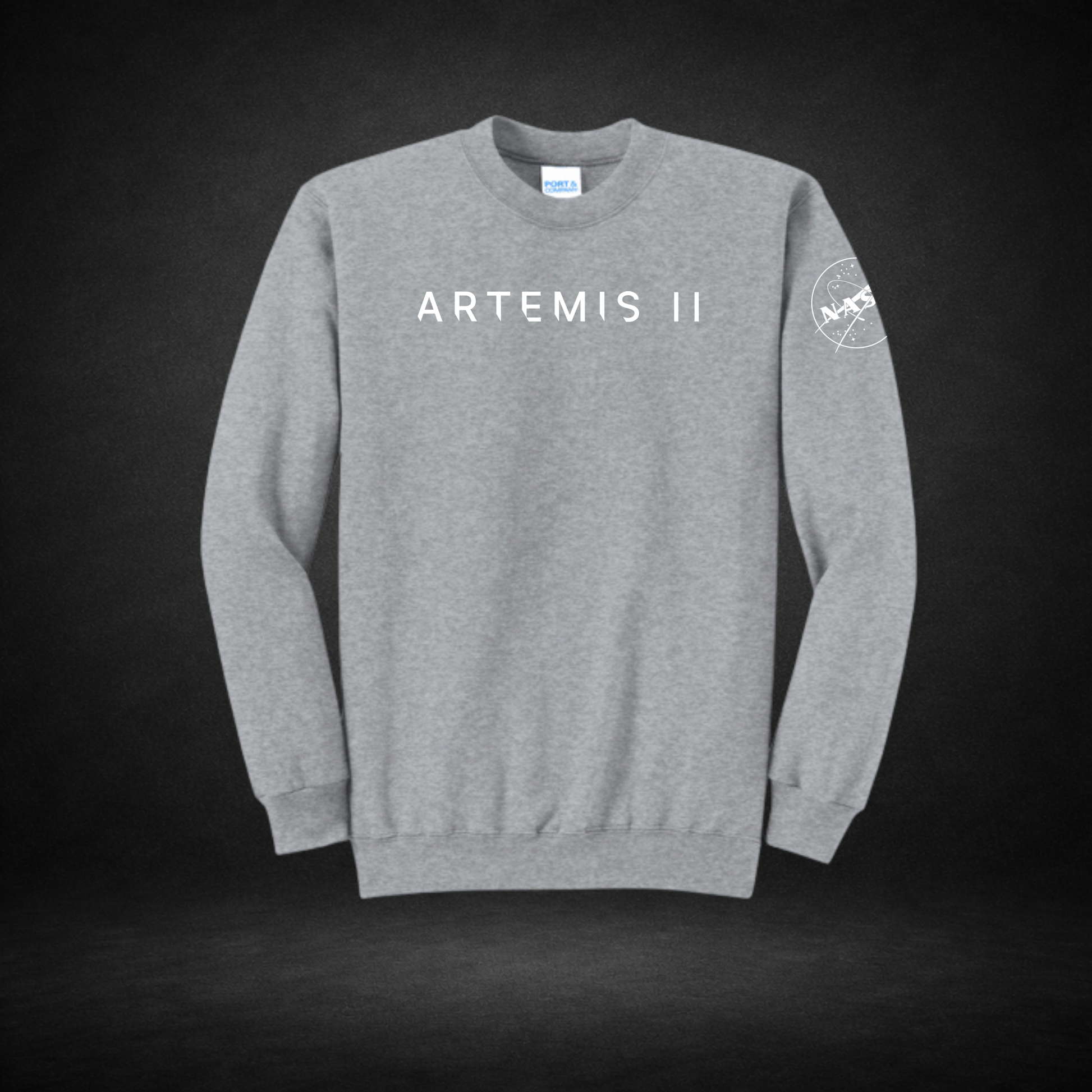 Gray sweatshirt with 'ARTEMIS II' text and NASA logo on a dark background