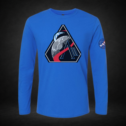 Blue long-sleeve shirt with Artemis II and NASA logos on a dark background