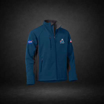 Navy and gray jacket with NASA Meatball, Artemis Logo, and American Flag on a dark background