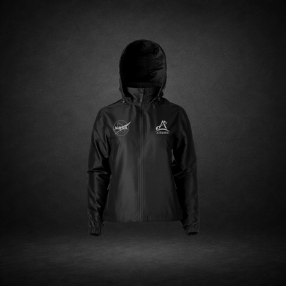 Black windbreaker with NASA Meatball and Artemis logos on a dark background
