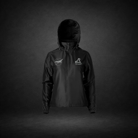 Black windbreaker with NASA Meatball and Artemis logos on a dark background