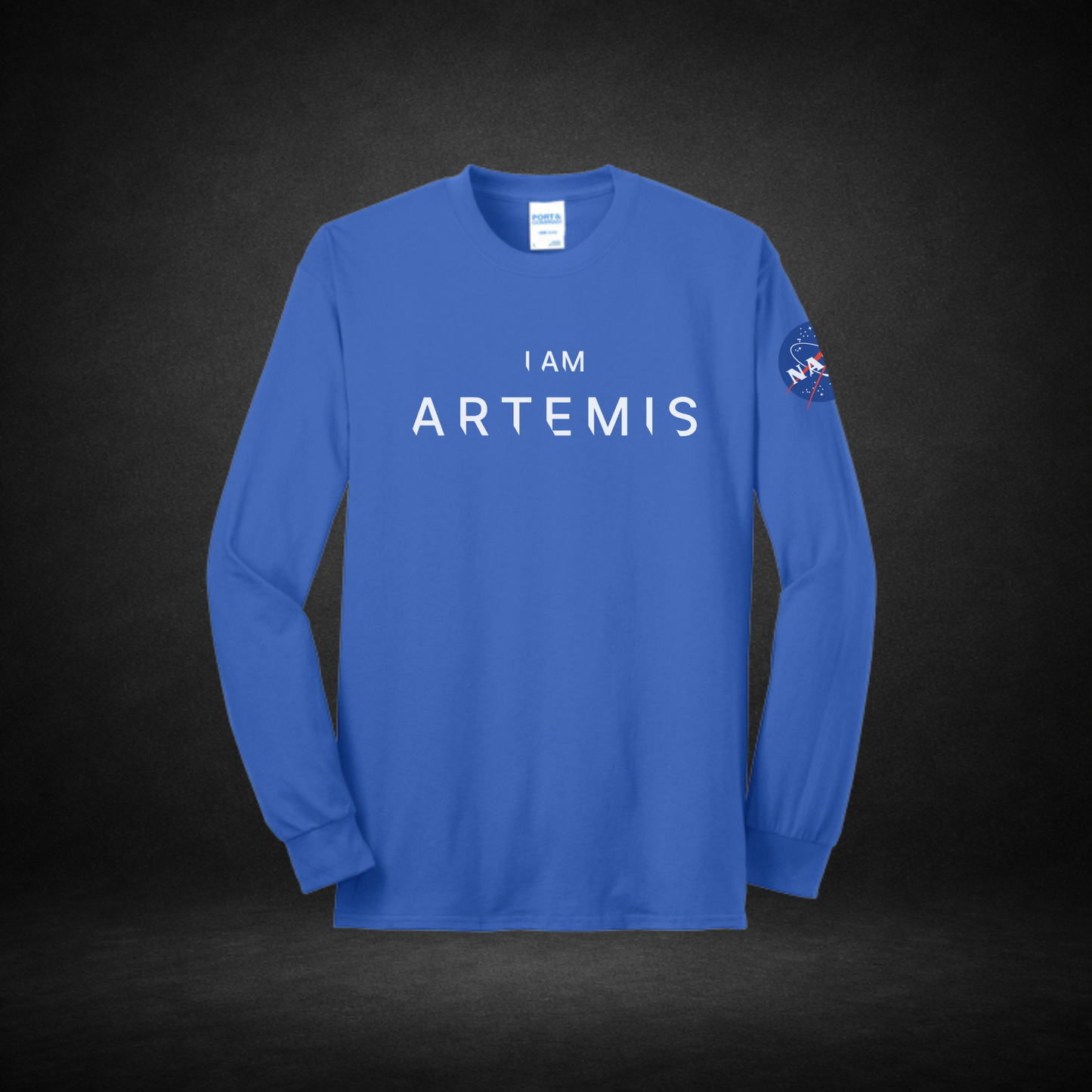 Blue long-sleeve shirt with 'I AM ARTEMIS' text and NASA logo on a dark background